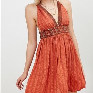 Rustic Orange patterned v neck mini sun dress